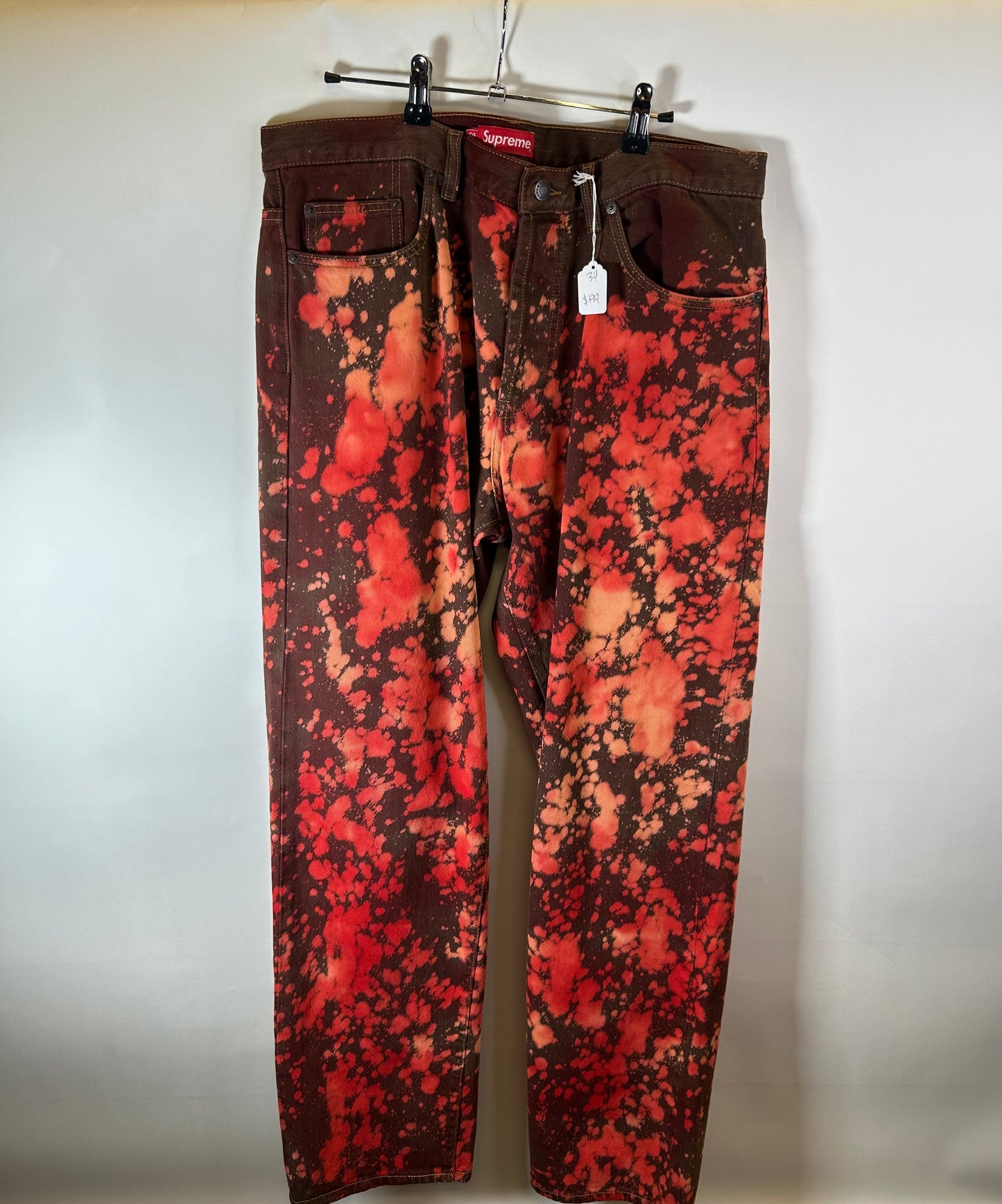 SUPREME Jeans Bleached Red